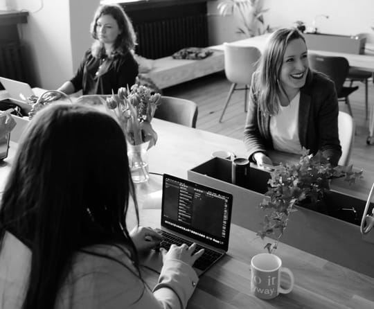 girls-coding-and-smiling